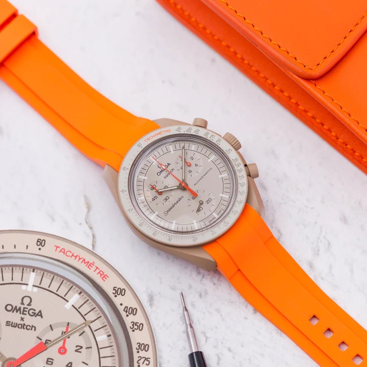 ساعت امگا سواچ ماموریت به مشتری بند رابر نارنجی Omega Swatch